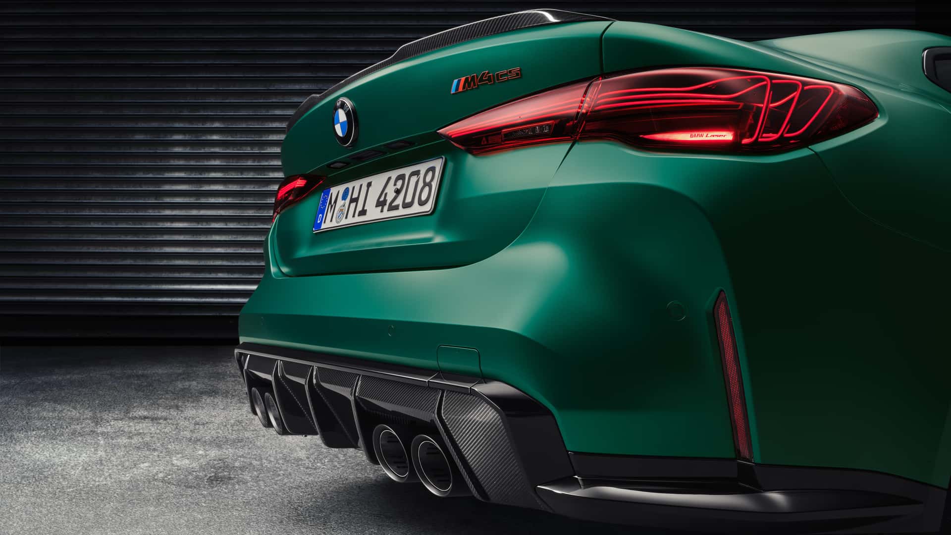 BMW M4 CS rear design with sharp taillights, aggressive diffuser, and sporty quad exhaust