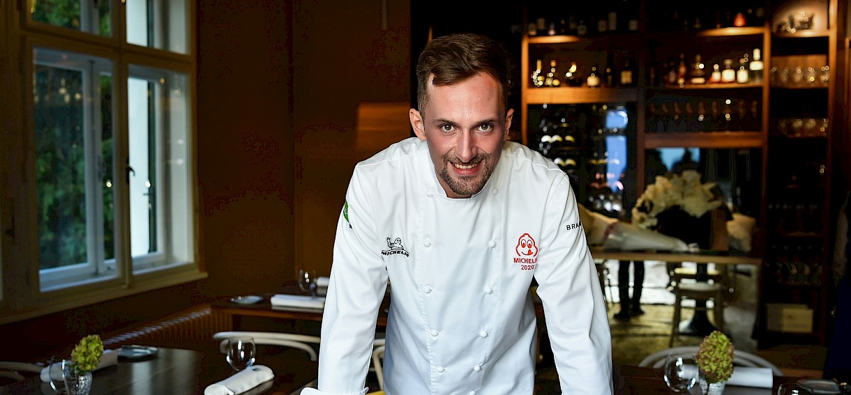 Chef Mojmir Šiftar inside Pen Klub restaurant, fine dining atmosphere and culinary experience Slovenia